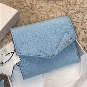 Light blue Calvin Klein Wallet. New with tags!!